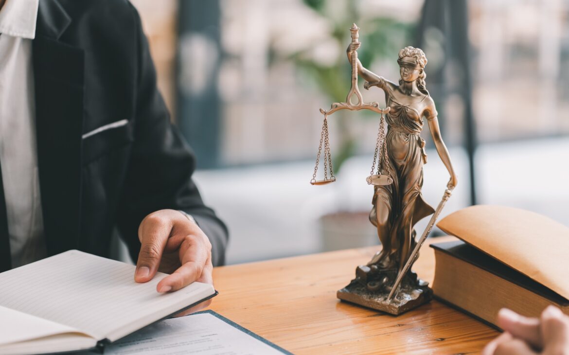 business people and lawyers discussing contract papers sitting at the table. Concepts of law, advice