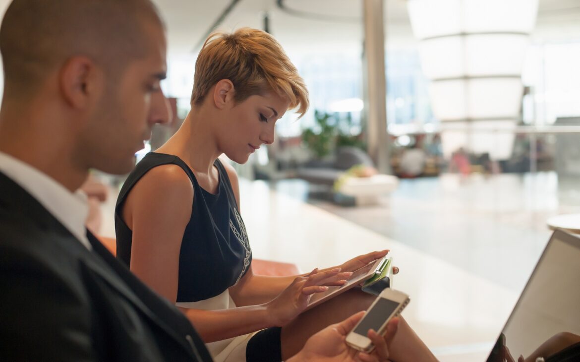 Business people using technology