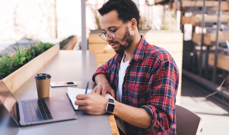 Millennial man planning organization for project