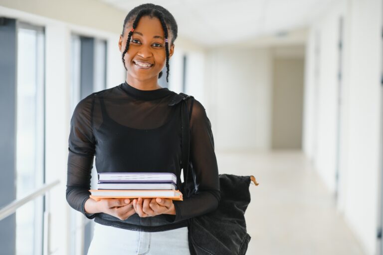 portrait of happy female african american college student