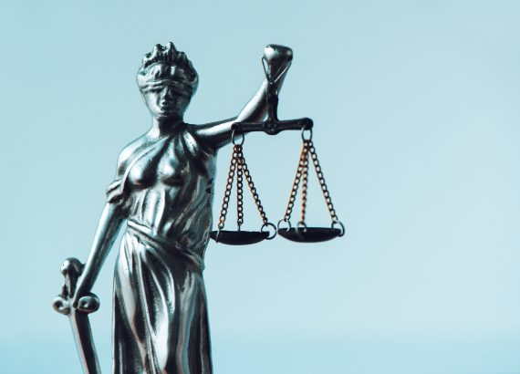 Lady Justice statue in law firm office